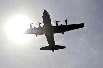 Hercules military aircraft in the sky. © Can Stock Photo / antonihalim