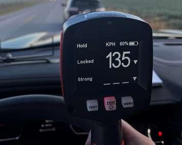 A police radar device showing 135 kilometres per hour is shown on September 17, 2024. Photo provided by Ontario Provincial Police.