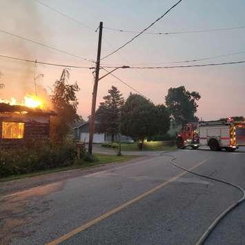 A fire at an abandoned building on Snye River Road on Walpole Island First Nation. July 30, 2025. (Photo courtesy of the Walpole Island Fire Department)