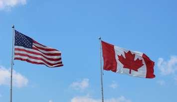 American & Canadian flags at Blue Water Bridge. (BlackburnNews.com photo by Dave Dentinger)