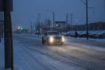 Snow falls in Olde Walkerville, Windsor, on December 24, 2017. Photo by Mark Brown/Blackburn News.