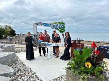 Essex Mayor Sherry Bondy (left), and WECF Executive Director Lisa Kolody (right), unveil the new 40th Anniversary Waterfront Legacy Project in Colchester Park, Essex, with members of Town Council, September 8, 2023. Photo provided by Town of Essex.