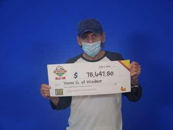 Vonni Genovesi of Windsor with his $78K cheque at the OLG Prize Centre in Toronto, July 9, 2020. Photo courtesy OLG.