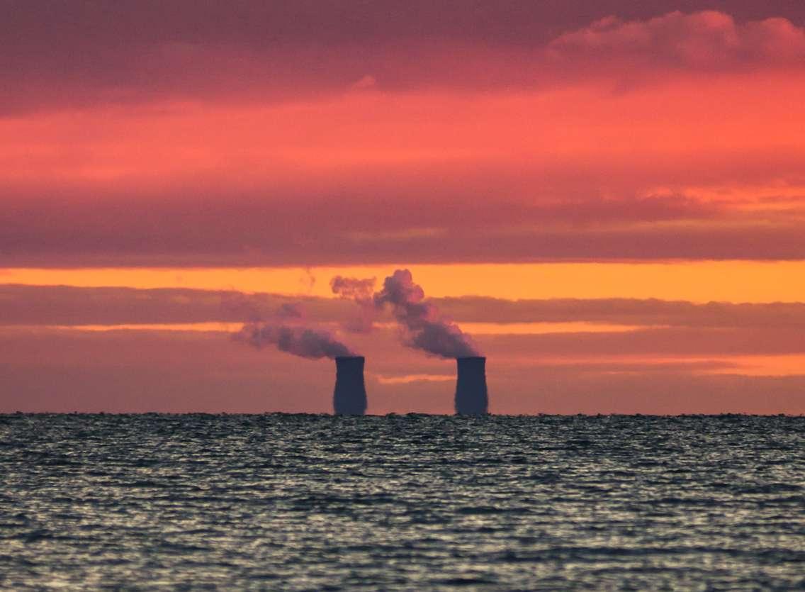 (Photo of the Enrico Fermi 2 Nuclear Generating Facility courtesy of seebest / Royalty-free / iStock / Getty Images Plus)