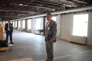 Bill Marra, president and CEO of Hotel-Dieu Grace Healthcare, shows where the mental health bed expansion project will be located within the Tayfour building on Prince Road. (Photo by Maureen Revait) 