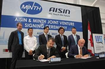 An agreement is signed between Minth and AISIN, August 5, 2025. (Photo by Maureen Revait) 
