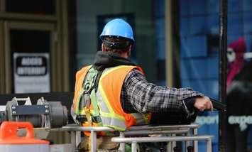 Man wearing a hard hat. (Photo by Life of Pix from Pexels)