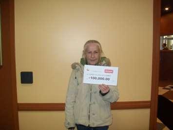 Debra Hillman of Comber holds her cheque from the OLG after winning on a scratch ticket. (Photo courtesy the OLG)