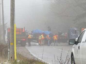 City crews clear debris from road after fatal crash at Sunningdale Rd. and Richmond St., November 24, 2016. (Photo by Miranda Chant, Blackburn News.)