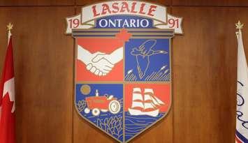 The Town of LaSalle's coat of arms hanging at LaSalle Town Hall. (Photo by Mike Vlasveld)