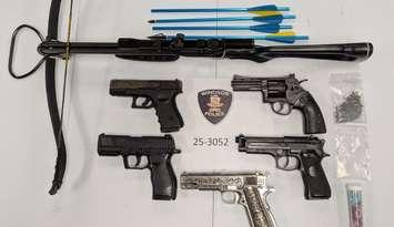 A crossbow and other weapons seized by Windsor police on January 17, 2025. Photo provided by Windsor police.