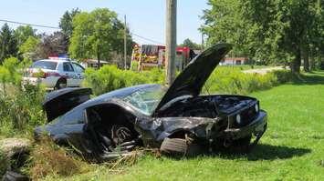 One man was sent to hospital after a vehicle crashed into a hydro pole on Longwoods Rd., near Colonel Talbot Rd., August 29, 2016. (Photo by Miranda Chant, Blackburn News)