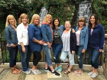 A group of eight lifelong friends from Sarnia who won $100,000 playing Lotto Max. (Photo provided by Leanne Gelinas)