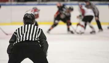 Ice hockey refree. Photo courtesy of © Can Stock Photo Inc. / Modestil