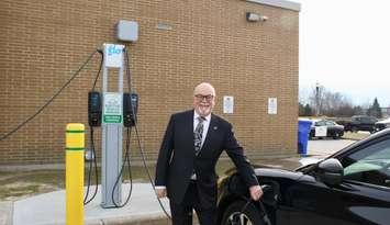 Tecumseh Mayor Gary McNamara tries out the new EV charging station at Tecumseh Town Hall, February 16, 2023. Photo courtesy Town of Tecumseh.