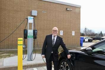 Tecumseh Mayor Gary McNamara tries out the new EV charging station at Tecumseh Town Hall, February 16, 2023. Photo courtesy Town of Tecumseh.