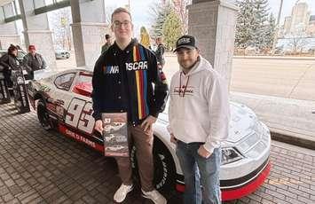 Jacob Wright, left, and Nathanial Greenaway following the reveal of the winning design for Greenaway's racecar at St. Clair College, February 28, 2025. Photo courtesy Rich Garton/St. Clair College.