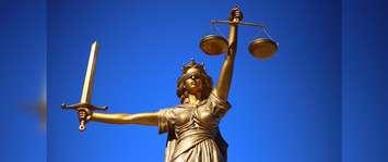Lady Justice statue. (Photo by WilliamCho from pixabay)