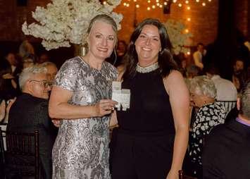 Chatham-Kent Hospice Foundation Executive Director, Jodi Maroney (L) with Diamond Draw winner Mari-Lynn Mifflin (R). (Image courtesy of the Chatham-Kent Hospice Foundation)
