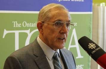 Ontario Minister of Energy Bob Chiarelli speaks at the University of Windsor, June 23, 2015. (Photo by Mike Vlasveld)