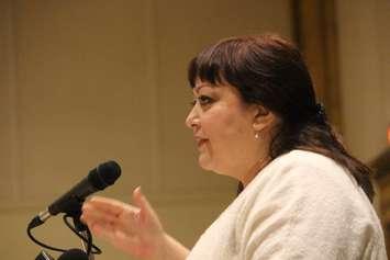 Natalie Mehra of the Ontario Health Coalition speaks at the Ciaciaro Club in Windsor during a public health care rally, August 26, 2015. (Photo by Mike Vlasveld)