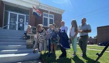 The Town of Essex unveils a heritage plaque outside the Essex Carnegie Library, September 5, 2024. (Photo by Maureen Revait) 