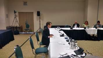 Matt Marchand, president of the Windsor-Essex Regional Chamber of Commerce, prepares to testify at a hearing on a proposed minimum wage increase for Ontario, at the St. Clair College Centre for the Arts in Windsor on July 14, 2017. Photo by Mark Brown/Blackburn News.