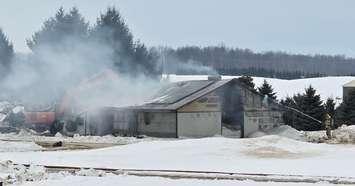 Firefighters on scene of a chicken barn fire on Concession Road 8 near Moorefield, February 25, 2025. Photo provided by Minto Fire Department. 