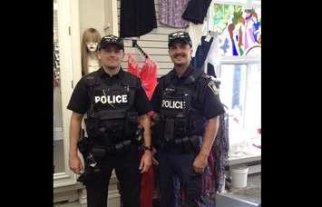 Officers with the Sarnia Police Service visit Silhouette's Boutique while on patrol in the city's downtown. Image courtesy of owner Lori Mitchell.