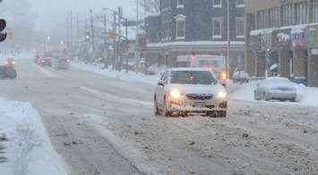 A vehicle navigates snowy conditions on Richmond Street in London. (File photo by Miranda Chant, Blackburn Media)