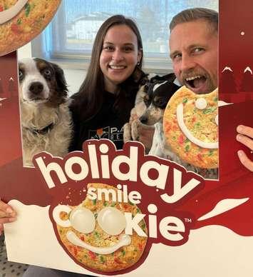  Becky, PAWR animal care attendant, and Scott, PAWR social media coordinator, Meg, Louis, and Rascal (Image courtesy of Pet and Wildlife Rescue)
