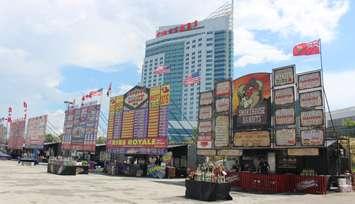 Ribbers set up for the 6th annual Windsor Ribfest at the Riverfront Festival Plaza, August 11, 2016. (Photo by Maureen Revait) 
