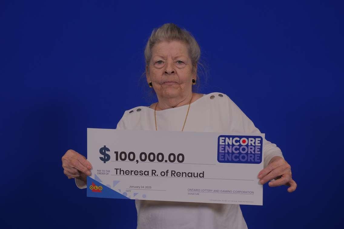 Theresa Renaud of Essex shows off her $100,000 cheque at the OLG Prize Centre in Toronto, January 24, 2025. Photo courtesy Ontario Lottery and Gaming.