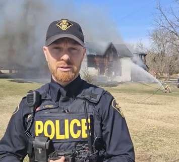 OPP Constable Andrew Gamble reports from the scene of a structure fire on Highway 6 outside Port Dover, March 25, 2024. Screenshot courtesy OPP West Region/X.