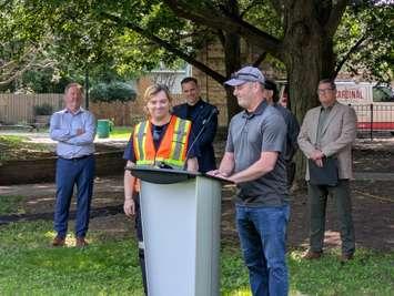 David Piper-Clark, in safety vest, and City of Windsor Horticulture Supervisor Mike Murphy at Mary Bibb Park, June 11, 2025. Photo by Mark Brown/WindsorNewsToday.ca.