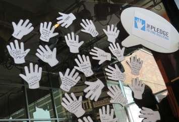 Students signed hand prints at the Covent Garden Market pledging to end bullying, November 10, 2016. (Photo by Miranda Chant, Blackburn News.)