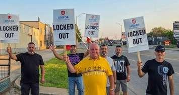 (Photo of workers at Titan Tool & Die in Windsor courtesy of Unifor)