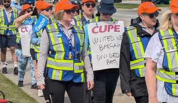 WSIB employees represented by CUPE picket on Tecumseh Road East in Windsor, May 27, 2025. Photo by Mark Brown/WindsorNewsToday.ca.