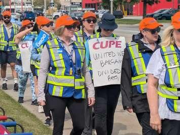 WSIB employees represented by CUPE picket on Tecumseh Road East in Windsor, May 27, 2025. Photo by Mark Brown/WindsorNewsToday.ca.