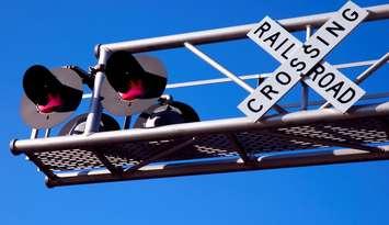 Train crossing sign. (Photo courtesy of © CanStockPhoto.com/Jerryb9)