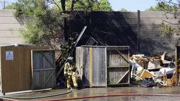 Sarnia Fire and Rescue puts out a sizeable dumpster fire off Exmouth St. July 19, 2017 (Photo by Melanie Irwin)
