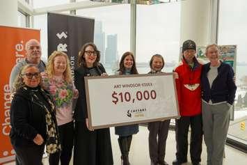 Representatives from Caesars Windsor and Art Windsor-Essex show off a $10,000 cheque at Art Windsor-Essex, January 11, 2024. Photo courtesy Art Windsor-Essex.