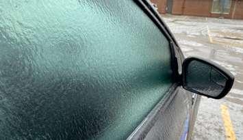 Freezing rain accumulates as ice buildup on a vehicle. (File photo by Matt Weverink)