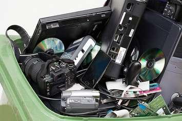 Old electronics in a bin. File photo courtesy of © Can Stock Photo / Bialasiewicz.