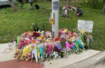A memorial continues to grow at the corner of Hyde Park and South Carriage roads in honour of a Muslim family who was run down Sunday night, June 8, 2021. Photo by Blair  Henatyzen.