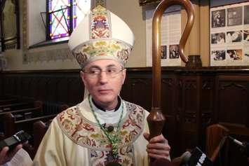 Bishop Ronald Fabbro addresses the media after a service on November 2, 2014. (Photo by Jason Viau)
