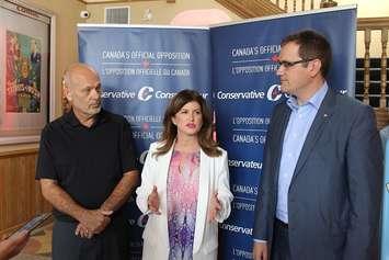 Interim Leader of the Conservative Party Rona Ambrose speaks in Chatham with Chatham-Kent-Leamington MP Dave Van Kesteren (left) and Central Okanagan—Similkameen—Nicola MP Dan Albas, August 11, 2016 (Photo by Jake Kislinsky)