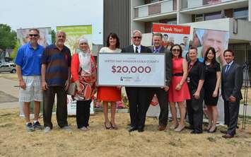 Caesars Windsor presents a cheque to the United Way for $20,000, July 28, 2016. (Photo provided by the United Way) 
