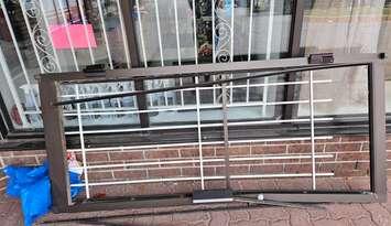 A destroyed door frame is seen outside Bob Reaume Sports in Windsor, November 11, 2024. Photo courtesy Bob Reaume Sports/Facebook.