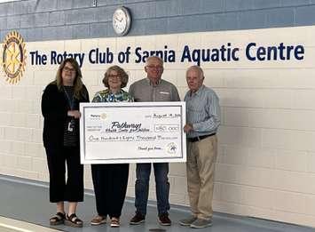 Members of Pathways with a cheque for the therapeutic pool (Photo by: Pathways Health Centre for Children)